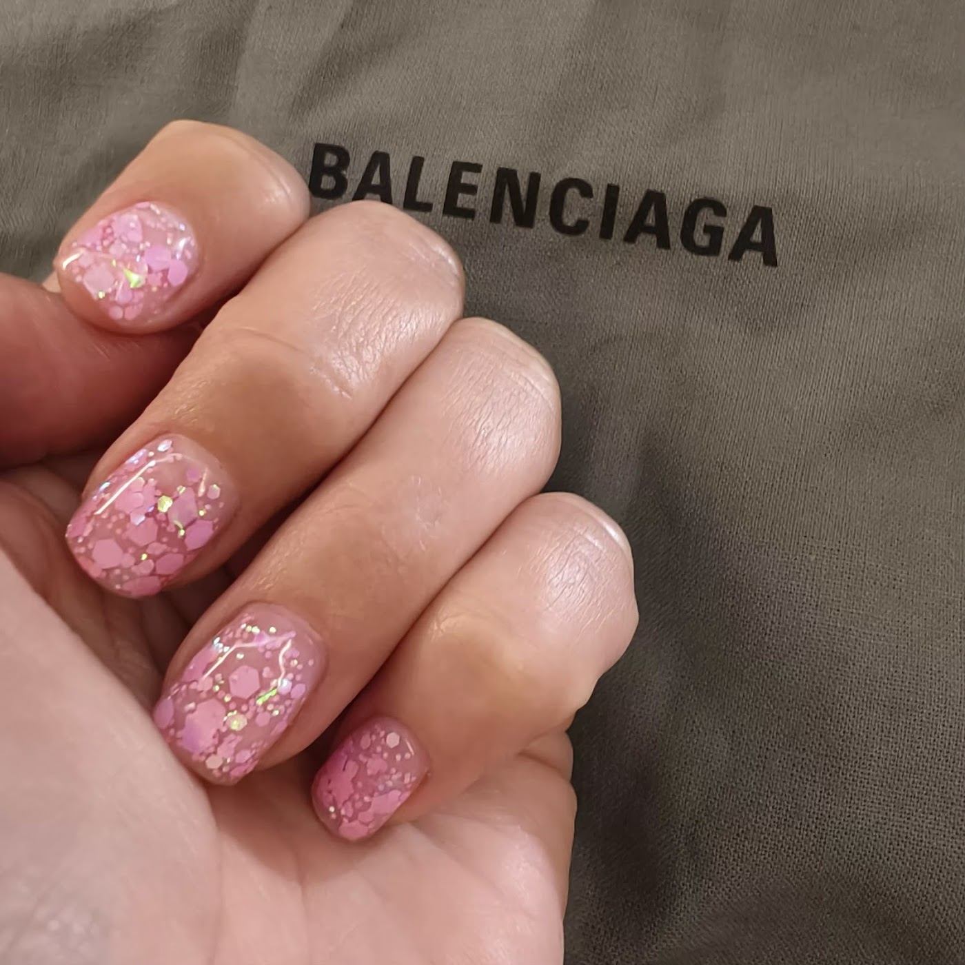 Pink nails with gold flake